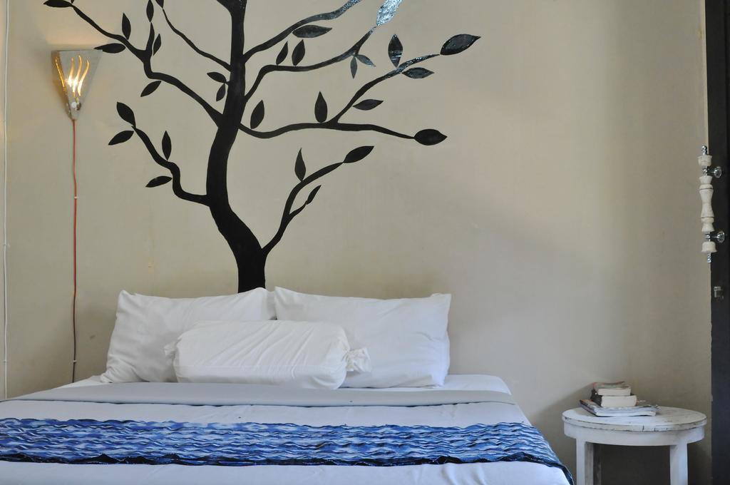 Three Little Birds Homestay กีลีตราวางัน ภายนอก รูปภาพ