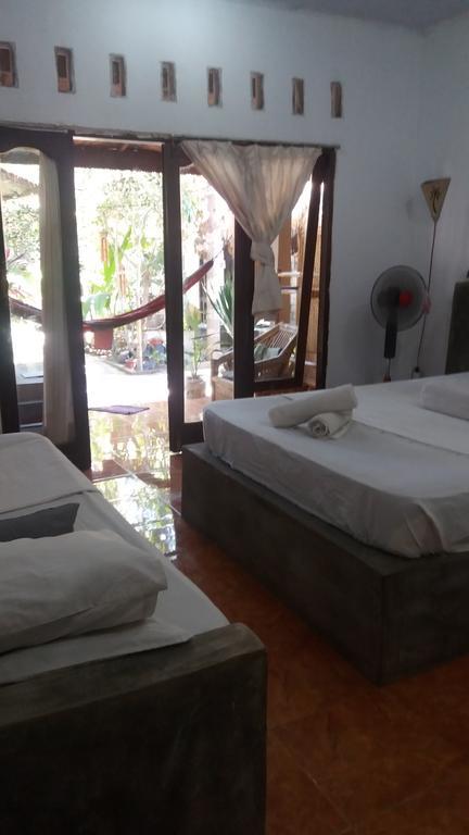 Three Little Birds Homestay กีลีตราวางัน ภายนอก รูปภาพ